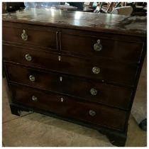 A George III mahogany bow front chest of three long and two short graduated drawers, stamped brass