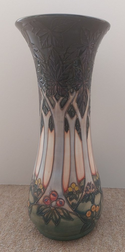 A tall tube lined stylised Moorcroft vase, decorated with a continuous band of woodland trees with - Image 3 of 7