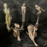 A collection of 5 resin and metal bronze effect statuettes
