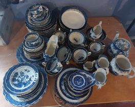 A Real Old Willow blue and white dinner and tea service and other pieces , approximately eighty