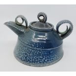 A Jane Hamlyn (born 1940) Salt-glazed stylised stoneware teapot with lid in blue With an Impressed