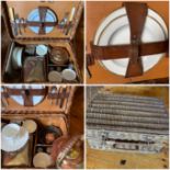 A vintage wicker picnic set containing a copper and brass spirit kettle, G W S and Sons. Coracle pot