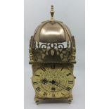 A Eureka electric lantern clock, the 18cm chapter ring stamped no 2217, signed Eureka clock co ltd