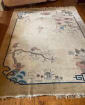 Large Chinese styled rug in cream. measuring 3.67 mtrs long by 2.7mtrs wide  crease half way down