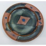 A Ray Finch (1914-2012) studio pottery charger / plate. Impressed mark for Ray Finch for