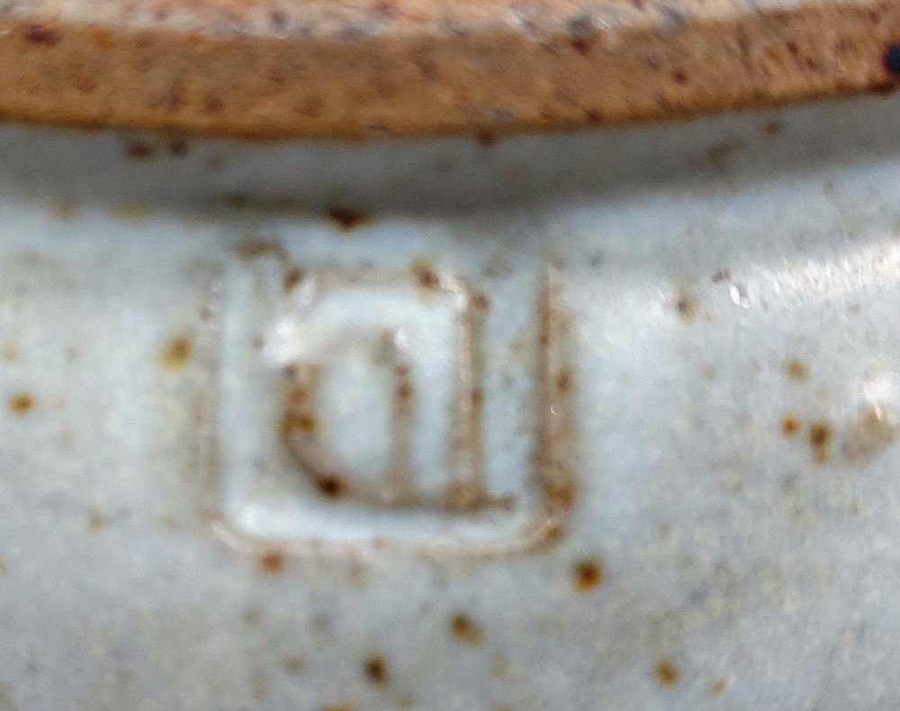 A David Leach (1911-2005). Stoneware plate, impressed mark DL. measuring 27cm across Condition: - Image 3 of 3