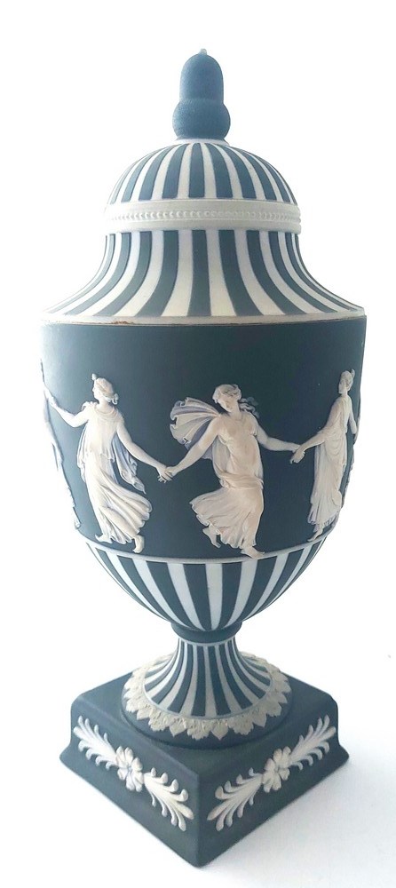 A Wedgwood black-dip jasper neo-classical style urn and cover on square base, impressed marks,