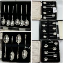 A set of six silver bean end coffee spoons, Birmingham 1933, another Sheffield 1928 another with