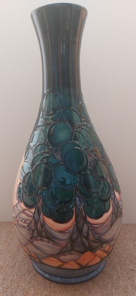 A very tall tube lined stylised Moorcroft vase, decorated with trees and landscape, with a river, - Image 3 of 7