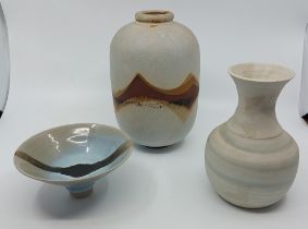 A Mixed lot of 20th C studio pottery comprising two vases and a footed bowl. (3) The 2 vases with a