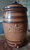 A large advertising  lidded stoneware 19c  glazed water filter for the Adkins Filter and Engineering