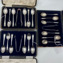 A set of six Edwardian silver apostle spoons with shell bowls and the matching sugar tongs,