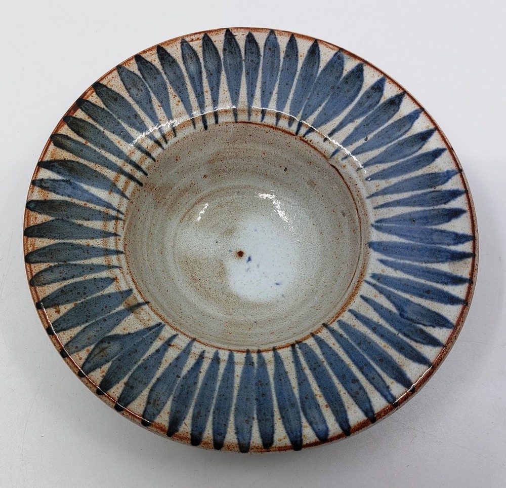 A Briglin Pottery stoneware dish circa 1970s. Impressed mark Briglin.  Measures 17 cm across the