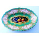A Royal Worcester oval dish, c1900, painted with pears and grapes by R. Seabright within a peach and