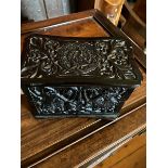 Ebony card Box, compartmentalised to hold several packs of cards. Heavily carved exterior to five