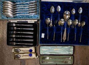 A collection of cased sterling silver and continental silver cutlery. Featuring a pair of Mappin and