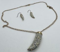 A 9ct gold jewellery set featuring a pair of cubic zirconia drop earrings and a pendant on chain