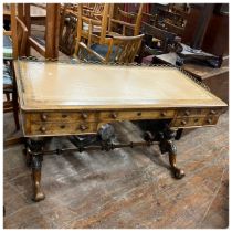 A Victorian pollard oak library, mounted with a three quarter brass gallery on a later leather inlay