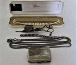 A white metal guard chain, with a fob clip and a horseshoe charm (approximate weight 137.7 grams);