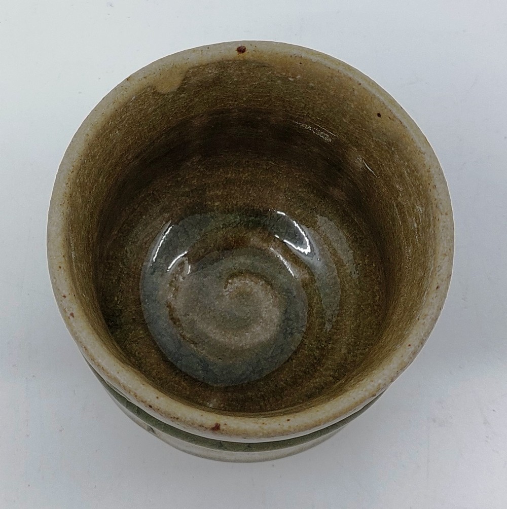A Phil Rogers (1951-2020). Stoneware yunomi (tea cup). in a green glaze, with Impressed marks. - Image 2 of 4
