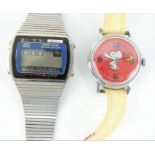 1960s Snoopy watch and a 1970s Zetron Melody digital watch