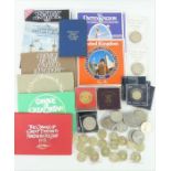 A collection of mainly British commemorative crowns and proof sets including 18 £2 coins