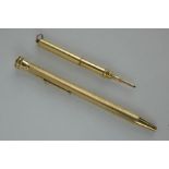 A yellow metal Sampson Mordan projecting pencil and a pencil marked 9ct.