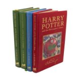 Rowling, J. K. Harry Potter. A collection of four Deluxe Editions comprising: Harry Potter and the