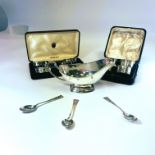 A collection of 20th century sterling silver featuring a footed sauce boat, marked for Elkington &