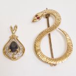 A 9ct yellow gold sapphire & diamond set pendant with a mid-century yellow metal snake brooch, set