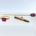 A collection of antique and vintage jewellery. Comprising a garnet cabochon stick pin in unmarked