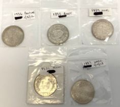 A selection of Half Crowns in UNC (Uncirculated) condition