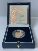 A 1999 cased Proof Half Sovereign