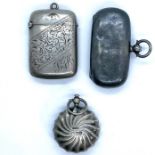 A Victorian sterling silver vesta along with a circular Victorian silver coin holder and an