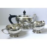 A Mappin and Webb silver 'Batchelor' tea set - teapot, jug and sugar bowl