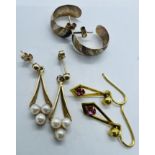 A pair of 9ct yellow gold and cultured pearl drop studs. Along with two further pairs of yellow