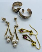 A pair of 9ct yellow gold and cultured pearl drop studs. Along with two further pairs of yellow