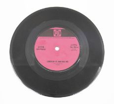 Justin Hayward 7" single. The Rare 45 rpm record `London Is Behind Me` with Day Must Come` on side