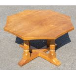 Workshop of Robert 'Mouseman' Thompson - An octagonal formed oak centre table, raised on notched