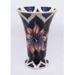 Moorcroft Pottery: a Moorcroft collectors club trumpet vase in 'Araura Pink Stargazer Lily' pattern.