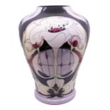 Moorcroft Pottery: A large limited edition baluster vase in 'White Rose' pattern. E Bossons, 14/