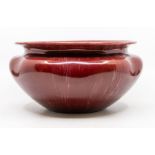 Pilkington's Royal Lancastrian - A low bowl decorated in red glaze, light blue glazed base with