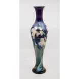 Moorcroft Pottery: A Moorcroft limited edition tall, slender baluster vase in 'Cloths of Heaven'