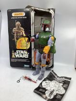 Vintage Kenner 13” Star Wars Boba Fett action figure with accessories to include Wookie scalps and a