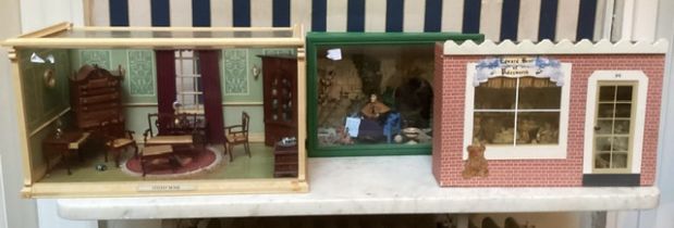 A selection of  3 dolls house vintage room boxes to include a teddy bear shop, a dining room