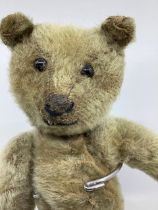 Antique Teddy bear-early 20th c with black boot button eyes 11” tall fully articulated. The teddy