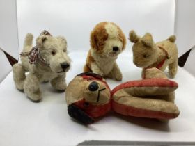 Vintage toy Mohair and other dog ; to includes a  chiltern red dog c 9” and a dog on rollers that