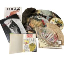 Vintage fashion books and hand fans to include Gowns by Adrian, The MGM years 1928-1941, Vogue