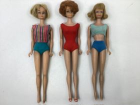 Mattel Barbie dolls 1960s ; vintage American girl doll with blonde bob.a bubble cut in red swim