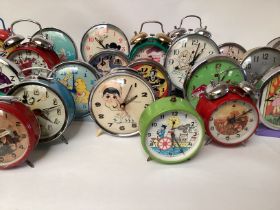 Vovelty vintage arable clocks with many childhood and other themes-Bell chime and alarms wind up inc